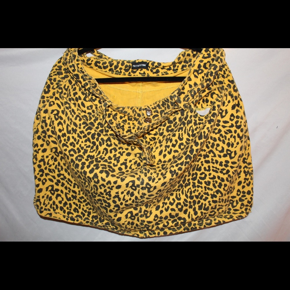 Deep yellow cheetah print skirt with a belt!